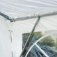 White party tent with gray metal frame and clear window sidewall panel
