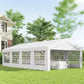 White event tent with arched window side panels and open interior