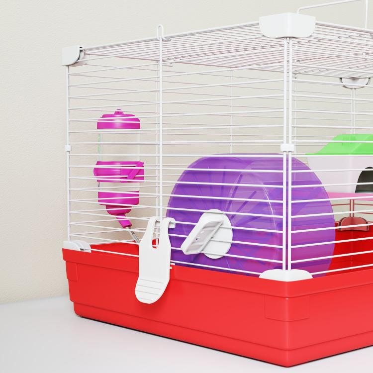 Red 2-story hamster cage with exercise wheel, water bottle, and purple ramp