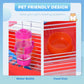 Hamster cage interior showing pink water bottle and orange food dish on red base