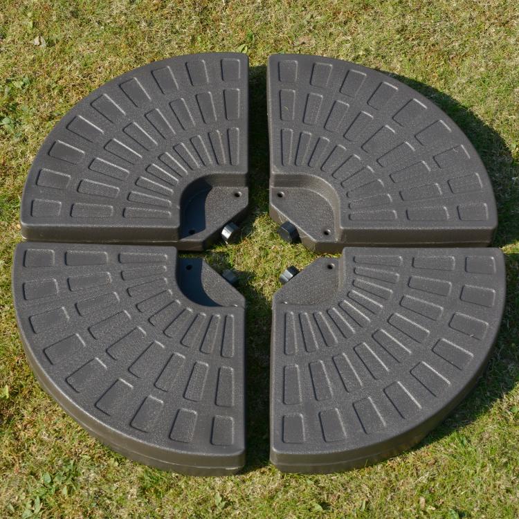 Fan-shaped patio umbrella base weight with textured grip surface and central mount, dark brown