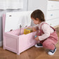 Pink toy storage bench with open lift-top lid and visible interior compartment