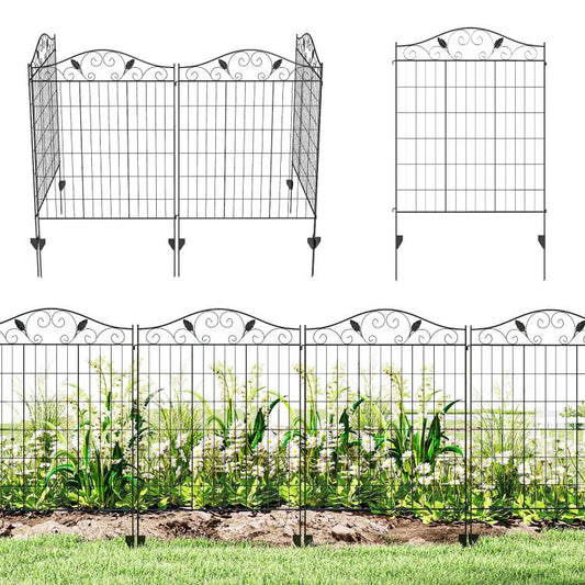 Black folding metal garden fence panel with decorative scroll top and ground stakes
