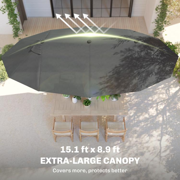 Underside view of dark gray patio umbrella canopy with vented panels