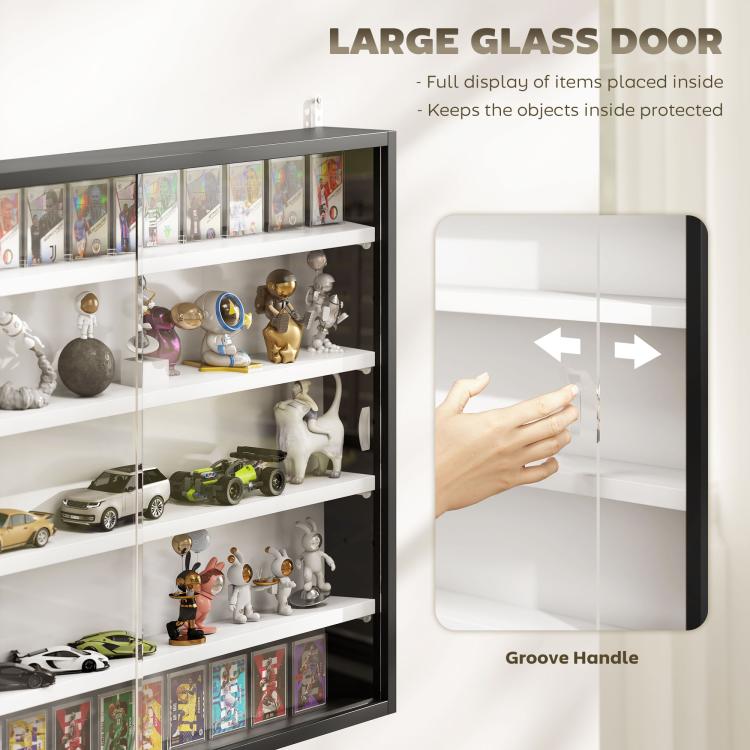 Black wall-mounted display cabinet with large glass door view of shelves and objects inside.