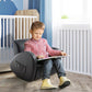 Grey rocking chair for kids with side pocket, child seated and reading