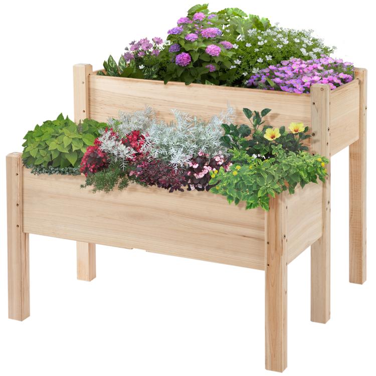 Two-tier wooden raised planter bed with mixed greens and purple flowers