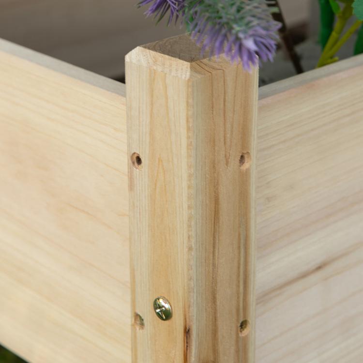 Light wood raised planter bed corner post with metal screws, two-tier frame