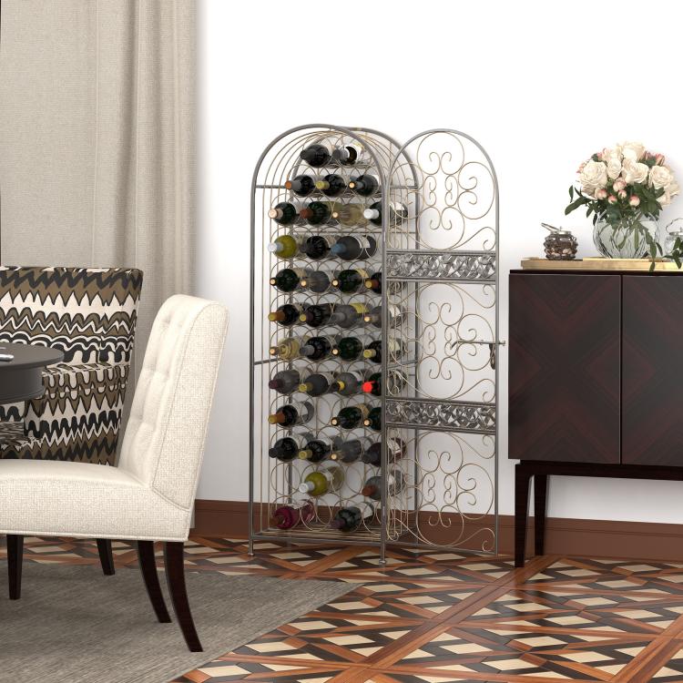 Antique bronze wine bottle rack with bottles inside, arched cage and open side