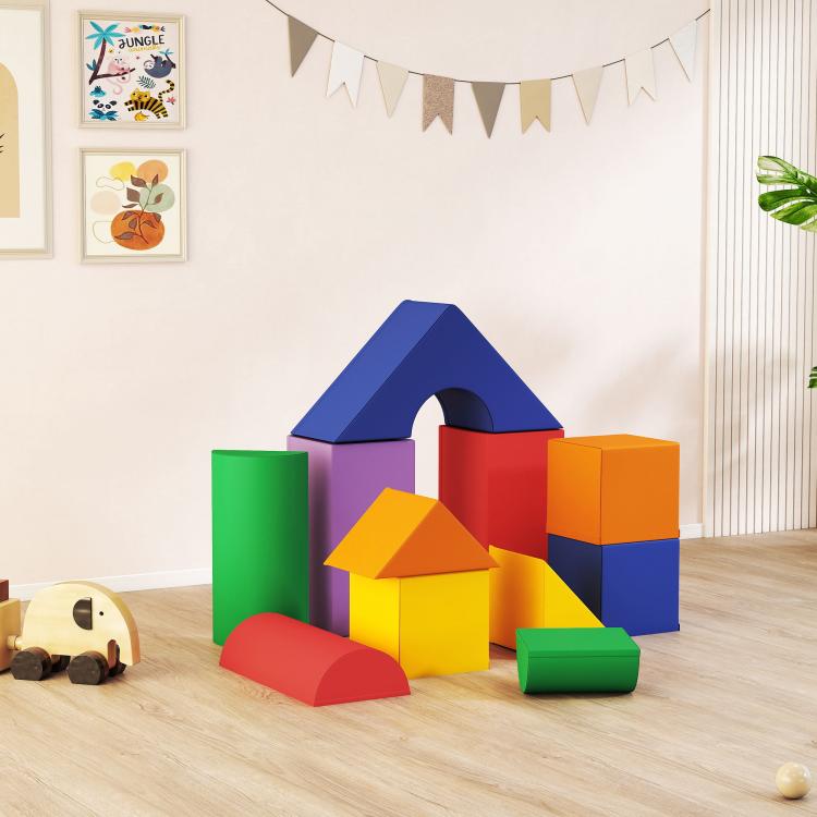 Play mat set with multicolor foam blocks forming a house and slide shapes