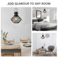 Black industrial pendant light with wire mesh shade shown in multiple room settings
