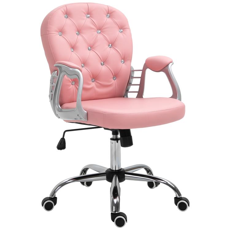 Pink button-tufted desk chair shown in side view with padded armrests and wheels