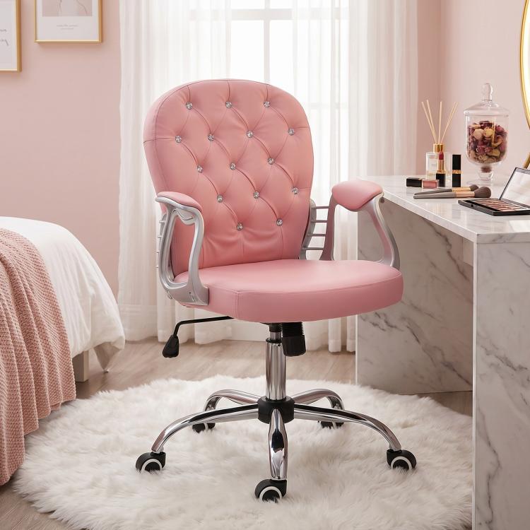 Pink button-tufted office chair with padded armrests, chrome base, and rolling casters