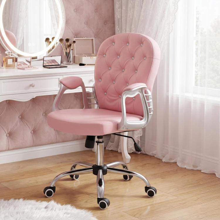 Pink button-tufted desk chair with silver arm frame, padded seat, and swivel wheels