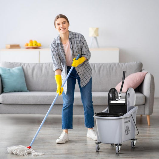 Gray mop wringer bucket cart with black basket insert and four rolling caster wheels