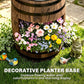 Close-up of rustic barrel fountain planter with multicolor flowers and decorative base