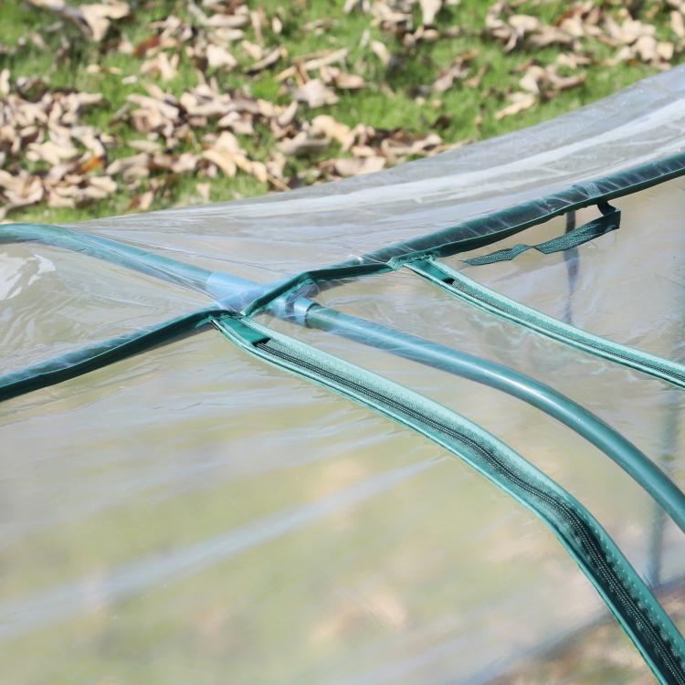 Green metal tunnel greenhouse kit with clear plastic cover, arched frame