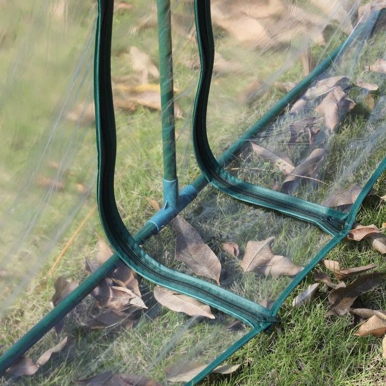 Plastic tunnel greenhouse kit close-up of clear cover panel on green frame poles