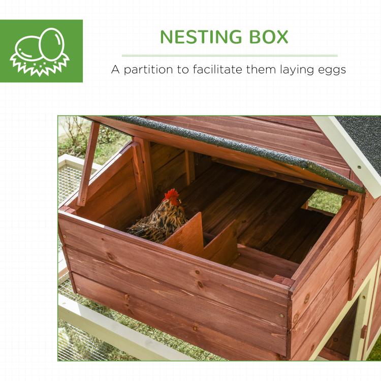 Wooden nesting box on chicken coop with open interior divider and sheltered floor