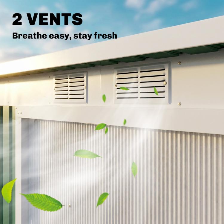 Metal storage shed interior with two vent openings under roof overhang