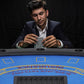 Poker table with blue felt, card tray opening, and circular cup holder wells
