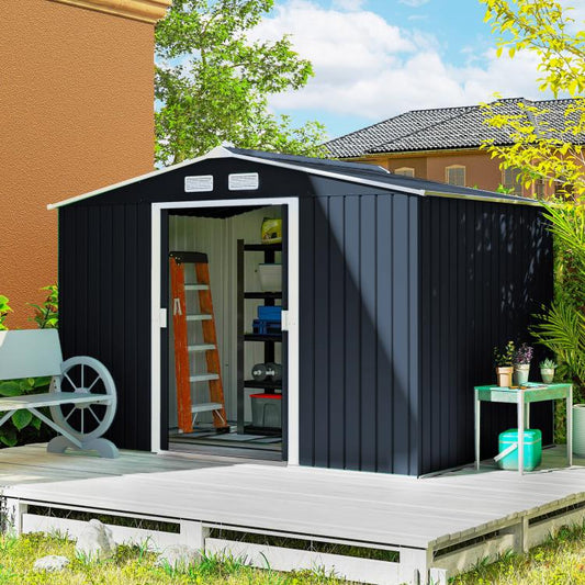 Dark gray metal outdoor storage shed with wide door opening and sloped roof