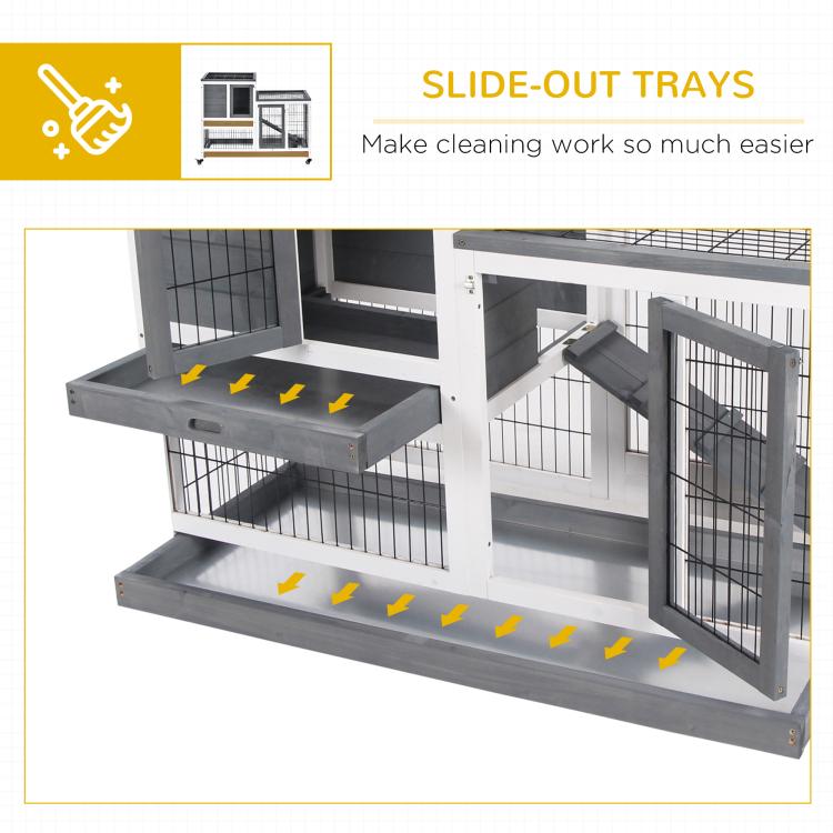 Rabbit hutch showing slide-out trays and wire levels inside enclosed frame