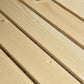 Natural wooden raised garden bed plank frame, side boards close-up