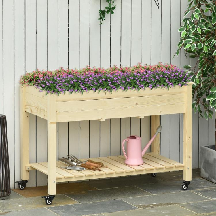 Two-tier raised garden bed in light wood with rolling wheels and storage shelf