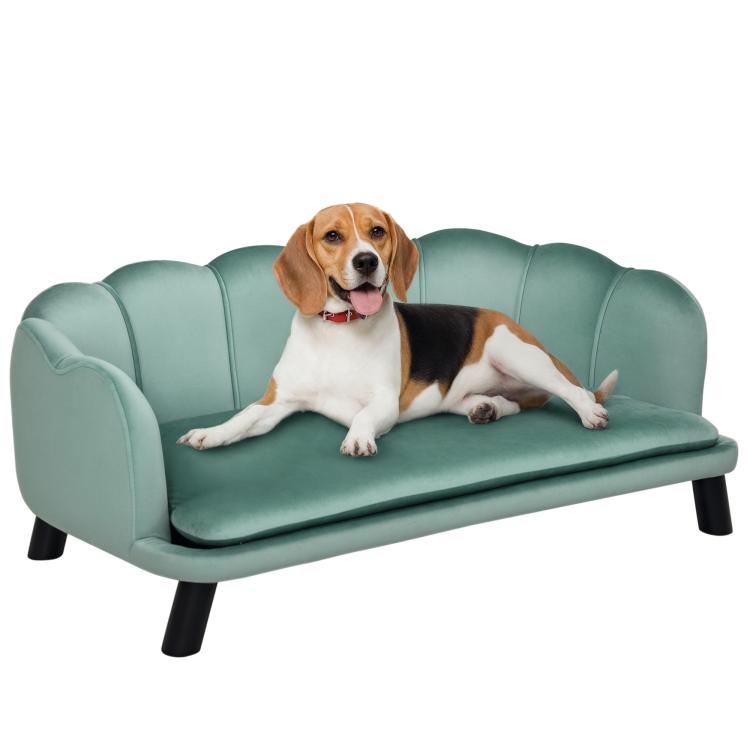 Green upholstered pet sofa bed with cushioned base, tufted back, and solid wood legs