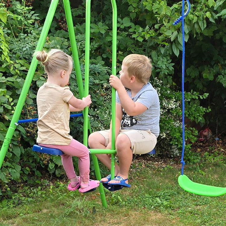 Outdoor green metal A-frame swing set with glider and two blue swing seats