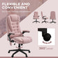 Pink velvet swivel office chair with 360-degree base and padded headrest and armrests