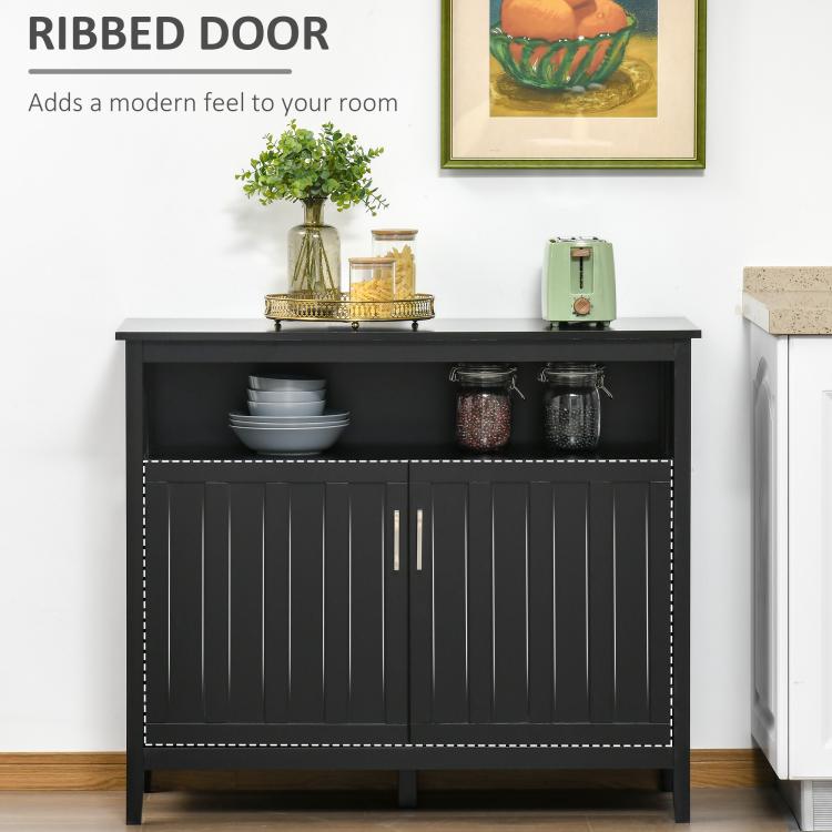 Black ribbed-panel sideboard doors with gold-tone bar handles