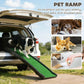 Pet ramp with green grip surface and raised rails for loading from a vehicle