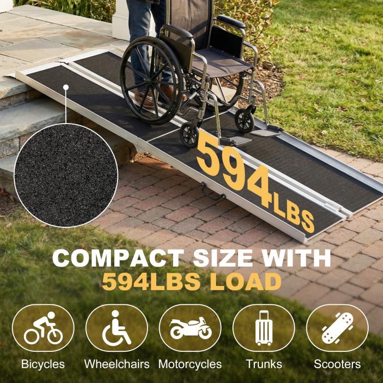Wheelchair ramp with black non-slip surface and silver frame, compact for use
