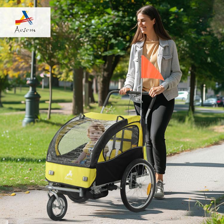 2-seat yellow and black bike trailer with two seats and see-through mesh sides