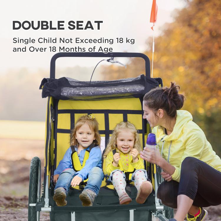 Double-seat yellow and black bike trailer with open canopy and three kids inside