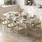 Light oak extendable oval dining table with dining chairs and place settings