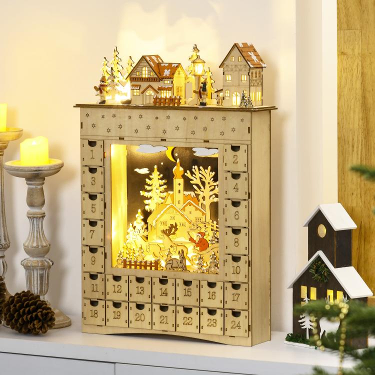 Wooden Christmas advent calendar with warm-lit window showing winter village scenery