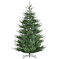 Green artificial Christmas tree with dense hinged branches and round metal stand