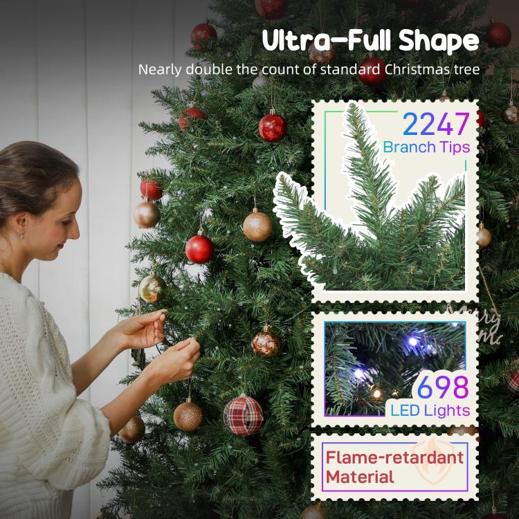 Artificial Christmas tree branch tips with LED lights and red and gold ornaments