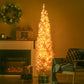 Pink pencil Christmas tree lit with warm white LED lights