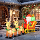 Inflatable Santa and reindeer yard decoration on sleigh, glowing lights outdoors