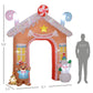 Candy house inflatable archway with gingerbread and snowman, shown with size diagram