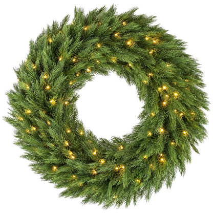 Green pre-lit artificial Christmas wreath with warm LED lights, round evergreen design