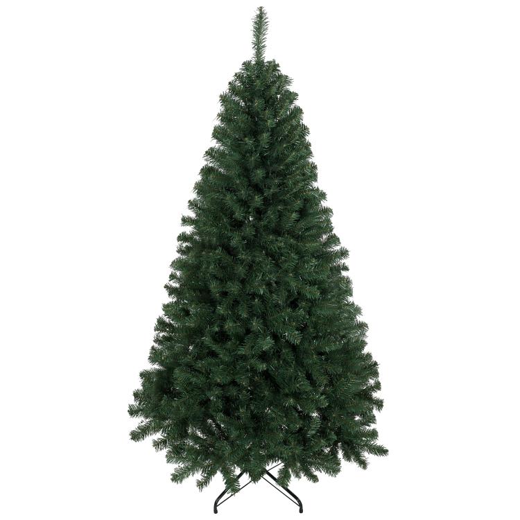 Artificial green Christmas tree with dense branches on black metal stand