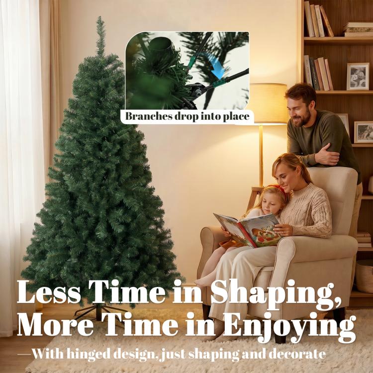 Artificial green Christmas tree with dense branches on metal stand