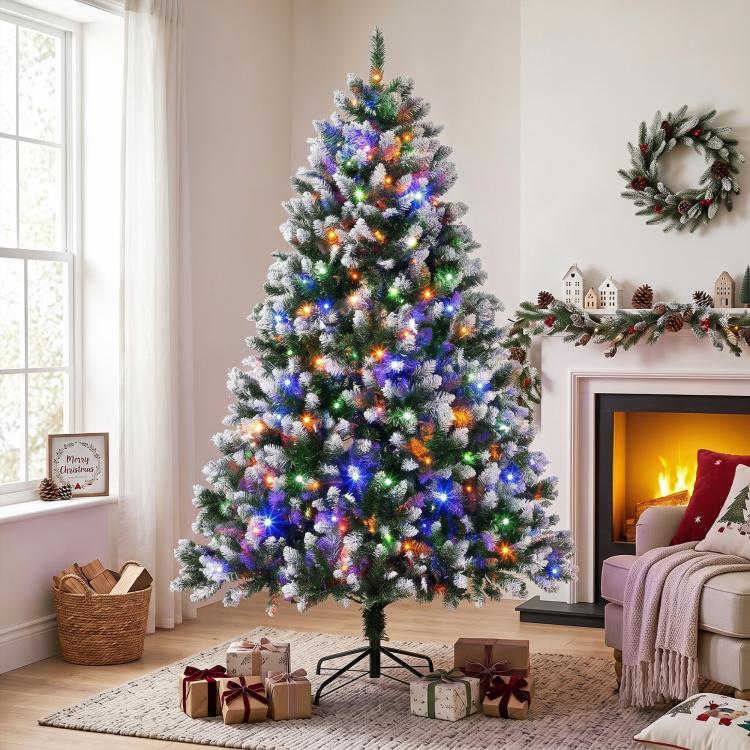 7.5 ft artificial Christmas tree with full snowy branches and multicolor pre-lit LEDs