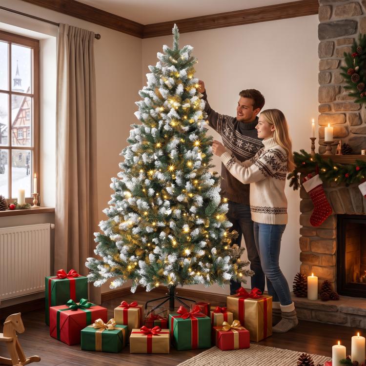 7.5 ft artificial Christmas tree with dense snowy branches and warm gold pre-lit LEDs