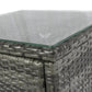Gray rattan wicker lounge chair corner with woven armrest and curved edge
